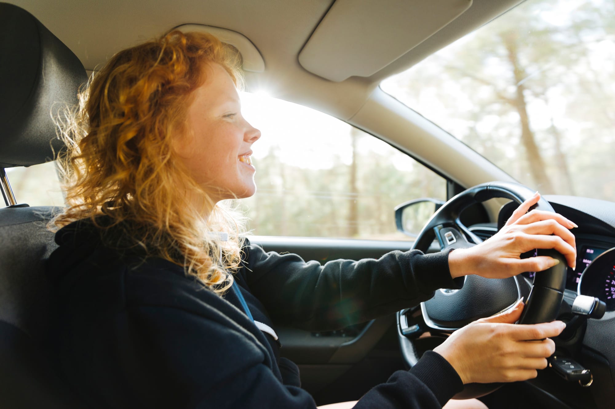 Smiling student behind the wheel